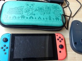 Nintendo Switch Console with Neon Red/Neon Blue Joy-Con Controller