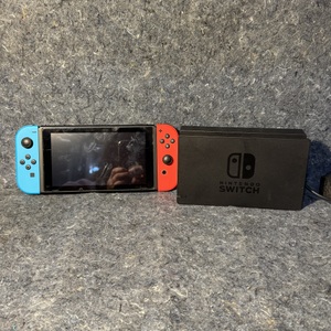 Nintendo Switch OLED with Blue and Red Joy-Con & Charging base