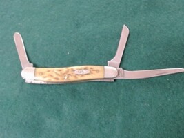 Case Peach Seed Jig Amber Bone Medium Stockman