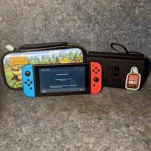 Nintendo Switch w/ charging dock, power cord, & zippered case