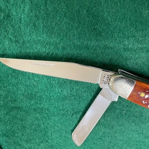 2000 Case Peach Seed Jig Dark Red Bone CS Medium Stockman